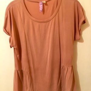 Blush peplum style blouse.